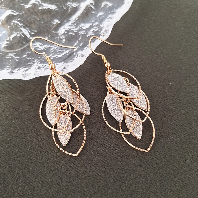 Boucles d'Oreilles en Forme de Feuille Dorée