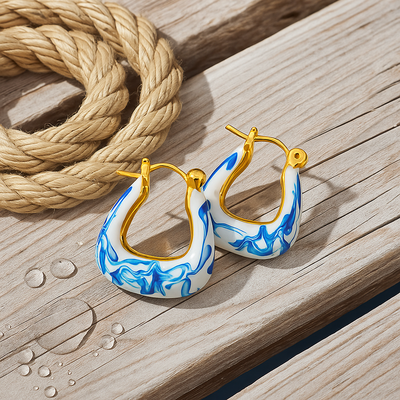 Kaïra | Boucles d'oreilles en mousse dorée ondulée